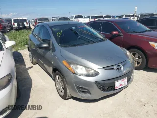 2014 Mazda 2 Sport with VIN JM1DE1KY6E0189739, listed as a Copart auction lot 76468914 with 107,164 mi miles and Salvage Title. Bid and sale history available at carsss.com. Image 4.