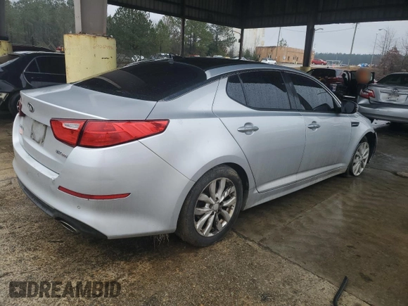 2015 Kia Optima EX with VIN 5XXGN4A73FG447349, listed as a Copart auction lot 89400895 with 235,069 mi miles and Salvage Title. Bid and sale history available at carsss.com. Image 3.