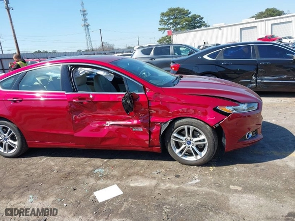 2015 Ford Fusion Energi Titanium with VIN 3FA6P0SU1FR202589, listed as a IAAI auction lot 41774824 with 93,000 mi miles. Bid and sale history available at carsss.com. Image 6.