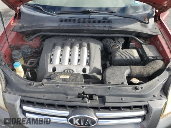 2005 Kia Sportage LX with VIN KNDJE723257052220, listed as a Copart auction lot 86979334 with 113,717 mi miles and Clean title. Bid and sale history available at DreamBid. Image 12.