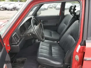 1993 Volvo 240 z VIN YV1AW8801P1942014, wystawiony jako Copart lot #69491174 z przebiegiem 145 809 mil mil oraz Szkody całkowita. Historia ofert i sprzedaży dostępna na DreamBid. Obrazek 7.