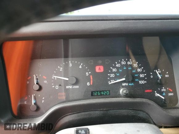 1999 Jeep Wrangler Sahara z VIN 1J4FY49S0XP432968, wystawiony jako Copart lot #65033715 z przebiegiem 126 420 mil mil oraz Szkoda całkowita • Salvage title. Historia ofert i sprzedaży dostępna na DreamBid. Obrazek 9.