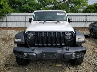 2021 Jeep Wrangler Unlimited Sport S z VIN 1C4HJXDN6MW608946, wystawiony jako Copart lot #62089045 z przebiegiem 33 305 mil mil oraz Szkoda całkowita • Salvage title. Historia ofert i sprzedaży dostępna na DreamBid. Obrazek 5.