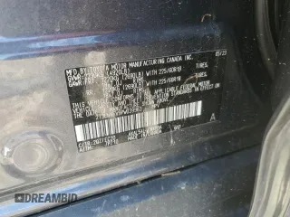 2023 Toyota RAV4 Hybrid XSE with VIN 2T3E6RFV9PW039963, listed as a Copart auction lot 57594335 with 27,486 mi miles and Salvage title. Bid and sale history available at DreamBid. Image 13.