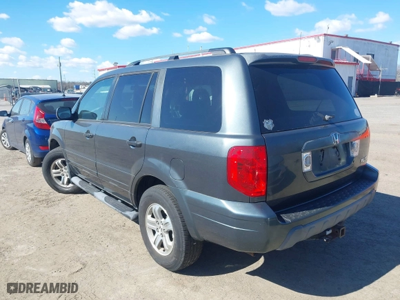 2005 Honda Pilot EX-L with NAVI with VIN 2HKYF18705H559938, listed as a IAAI auction lot 41814487 with 188,665 mi miles. Bid and sale history available at carsss.com. Image 3.