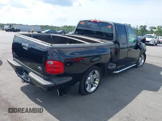 2000 Ford F-150 XL z VIN 2FTRX07L9YCA98355, wystawiony jako IAAI lot #42123587 z przebiegiem 191 000 mil mil oraz . Historia ofert i sprzedaży dostępna na DreamBid. Obrazek 4.