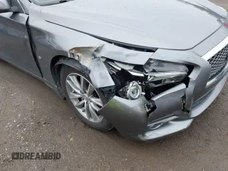 2014 Infiniti Q50 Premium с VIN JN1BV7AR1EM702573, выставлен на аукционе IAAI как лот 42186791 с пробегом 162 627 миль миль и . История ставок и продаж доступна на DreamBid. Изображение 6.