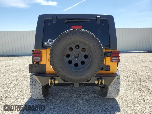 2013 Jeep Wrangler Unlimited Rubicon with VIN 1C4BJWFG9DL543798, listed as a Copart auction lot 49322385 with 159,674 mi miles and Salvage Title. Bid and sale history available at carsss.com. Image 6.