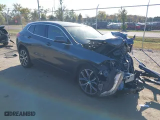 2018 BMW X2 xDrive28i with VIN WBXYJ5C33JEF69549, listed as a IAAI auction lot 40695422 with 95,000 mi miles. Bid and sale history available at carsss.com. Image 1.