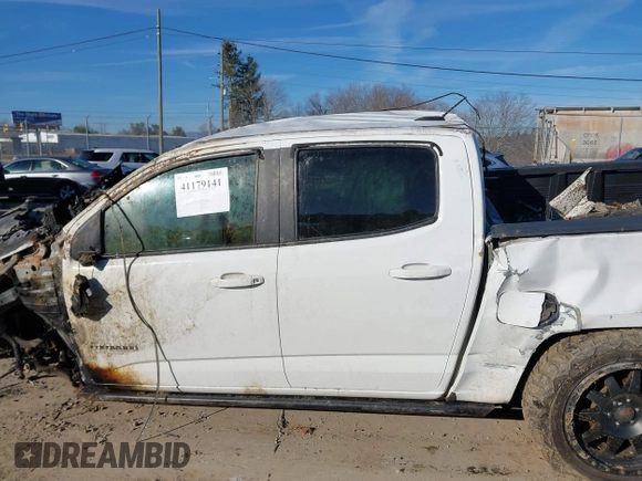2015 Chevrolet Colorado 4WD Z71 with VIN 1GCGTCE3XF1207119, listed as a IAAI auction lot 41179141 with Not provided miles and . Bid and sale history available at DreamBid. Image 13.