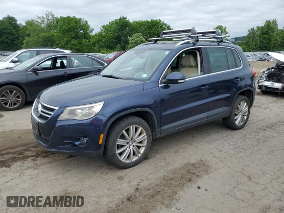 2011 Volkswagen Tiguan SEL z VIN WVGBV7AX2BW534482, wystawiony jako Copart lot #61097265 z przebiegiem 186 282 mil mil oraz Czysty tytuł • Clean title. Historia ofert i sprzedaży dostępna na DreamBid. Obrazek 1.