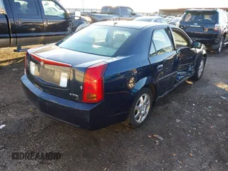 2006 Cadillac CTS with VIN 1G6DM57T060106608, listed as a IAAI auction lot 41233161 with 141,503 mi miles. Bid and sale history available at carsss.com. Image 4.
