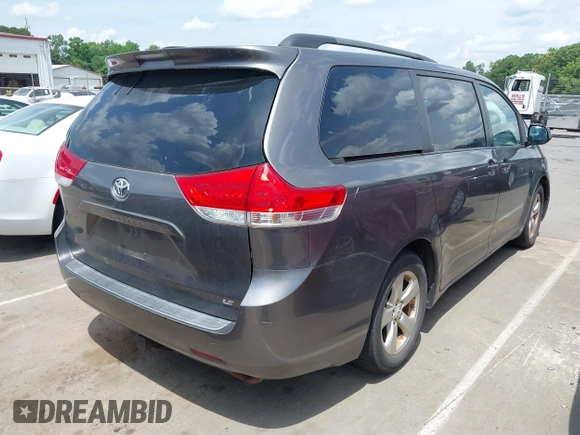 2011 Toyota Sienna LE AAS with VIN 5TDKK3DC1BS164723, listed as a IAAI auction lot 42145480 with 220,349 mi miles. Bid and sale history available at carsss.com. Image 4.