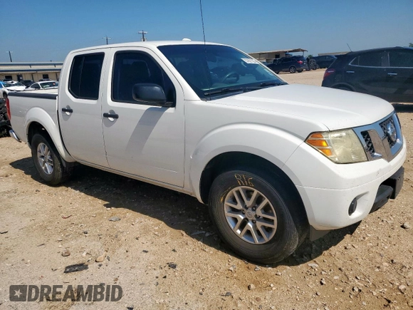 2015 Nissan Frontier SV with VIN 1N6AD0ER8FN709073, listed as a Copart auction lot 57821555 with 191,708 mi miles and Salvage title. Bid and sale history available at DreamBid. Image 4.