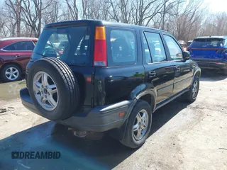 1999 Honda CR-V EX with VIN JHLRD1863XC049666, listed as a IAAI auction lot 41731848 with 153,071 mi miles. Bid and sale history available at carsss.com. Image 4.