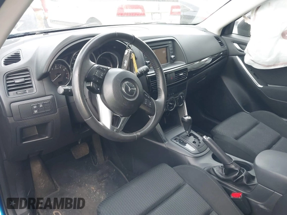 2013 Mazda CX-5 Touring with VIN JM3KE4CE0D0160711, listed as a IAAI auction lot 41843658 with 65,391 mi miles. Bid and sale history available at carsss.com. Image 5.