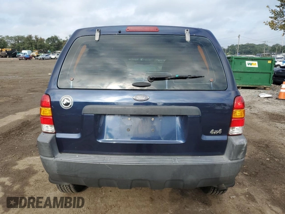 2004 Ford Escape XLS with VIN 1FMYU92104KA21454, listed as a Copart auction lot 74139564 with 217,731 mi miles and Salvage Title. Bid and sale history available at DreamBid. Image 6.