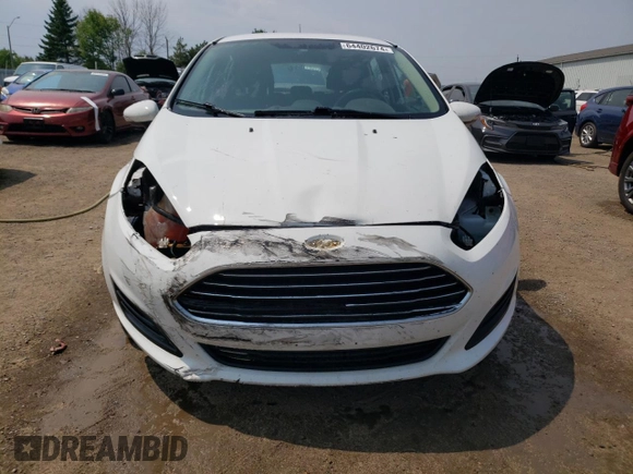 2015 Ford Fiesta SE z VIN 3FADP4EJ7FM169000, wystawiony jako Copart lot #64402674 z przebiegiem 191 221 mil mil oraz Szkoda całkowita • Salvage title. Historia ofert i sprzedaży dostępna na DreamBid. Obrazek 5.