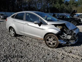 2014 Ford Fiesta SE with VIN 3FADP4BJ7EM134802, listed as a Copart auction lot 49596025 with 98,155 mi miles and Salvage Title. Bid and sale history available at DreamBid. Image 4.
