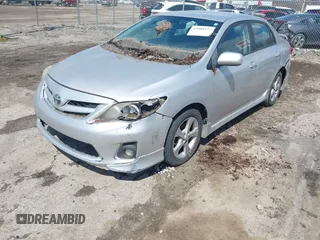 2011 Toyota Corolla L with VIN 2T1BU4EE5BC560999, listed as a IAAI auction lot 42008127 with 130,273 mi miles. Bid and sale history available at carsss.com. Image 2.