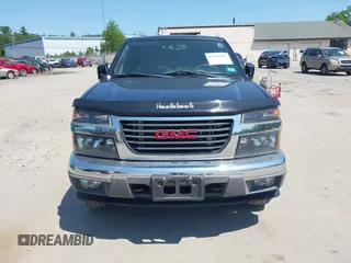 2012 GMC Canyon SLE1 z VIN 1GTH6MFE6C8140488, wystawiony jako IAAI lot #42399125 z przebiegiem 92 729 mil mil oraz . Historia ofert i sprzedaży dostępna na DreamBid. Obrazek 12.