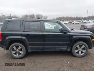 2016 Jeep Patriot Latitude with VIN 1C4NJRFB1GD523904, listed as a IAAI auction lot 42017736 with 164,705 mi miles. Bid and sale history available at carsss.com. Image 13.
