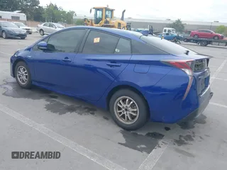 2018 Toyota Prius Two with VIN JTDKBRFU7J3066126, listed as a IAAI auction lot 42064006 with 119,947 mi miles and . Bid and sale history available at carsss.com. Image 3.