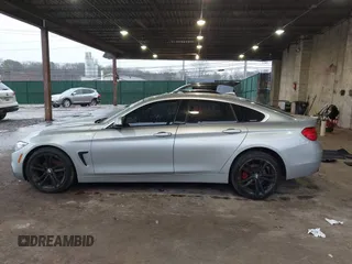 2016 BMW 4 Series 428i xDrive with VIN WBA4C9C56GG139973, listed as a IAAI auction lot 41834506 with 94,587 mi miles and . Bid and sale history available at DreamBid. Image 14.