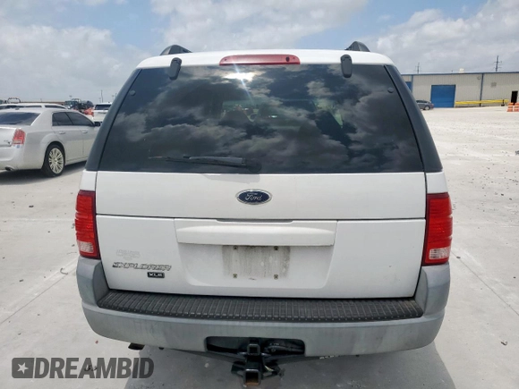 2002 Ford Explorer XLS with VIN 1FMZU62E62UA69368, listed as a Copart auction lot 61571065 with 124,095 mi miles and Salvage title. Bid and sale history available at DreamBid. Image 6.