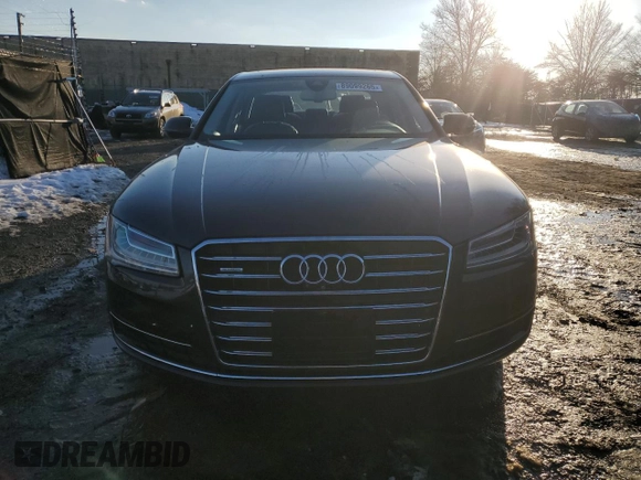 2015 Audi A8 z VIN WAUJGAFD4FN028750, wystawiony jako Copart lot #89099265 z przebiegiem 44 149 mil mil oraz Szkoda całkowita • Salvage title. Historia ofert i sprzedaży dostępna na DreamBid. Obrazek 5.