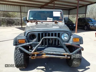 2005 Jeep Wrangler Sport with VIN 1J4FA49S45P345673, listed as a IAAI auction lot 41830128 with 139,432 mi miles. Bid and sale history available at carsss.com. Image 12.