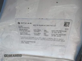 2023 Rivian R1T Adventure with VIN 7FCTGAAA0PN021864, listed as a IAAI auction lot 41620630 with 1 mi miles. Bid and sale history available at carsss.com. Image 9.