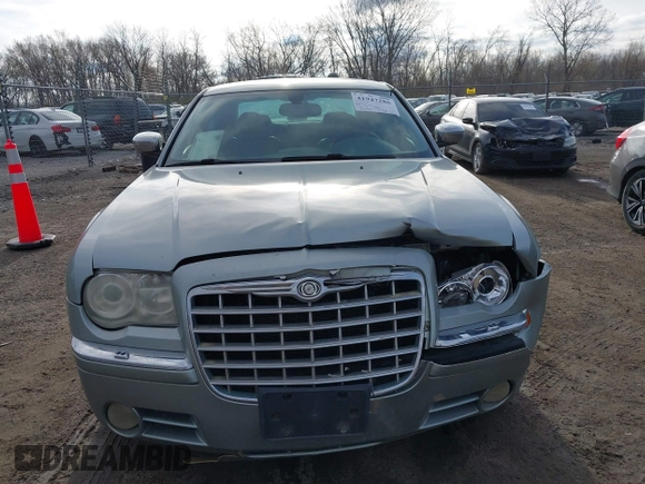 2006 Chrysler 300 C with VIN 2C3LK63H56H423161, listed as a IAAI auction lot 41947286 with 227,092 mi miles and . Bid and sale history available at carsss.com. Image 12.