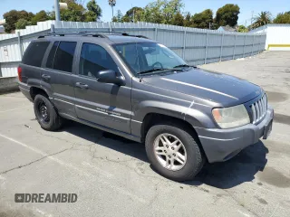 2004 Jeep Grand Cherokee Laredo with VIN 1J4GW48S54C430857, listed as a Copart auction lot 62744305 with 122,099 mi miles and Salvage title. Bid and sale history available at DreamBid. Image 4.