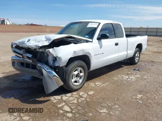 1999 Dodge Dakota SLT with VIN 1B7GL22X6XS186007, listed as a IAAI auction lot 41953254 with 322,541 mi miles. Bid and sale history available at carsss.com. Image 2.