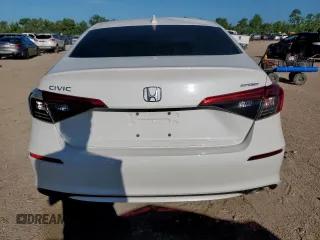 2023 Honda Civic Sport with VIN 2HGFE2F57PH511027, listed as a Copart auction lot 62703695 with 33,899 mi miles and Salvage title. Bid and sale history available at DreamBid. Image 6.
