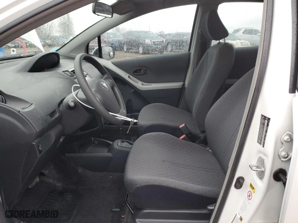 2009 Toyota Yaris with VIN JTDKT903395249312, listed as a Copart auction lot 49494835 with 294,865 mi miles and Clean Title. Bid and sale history available at carsss.com. Image 7.