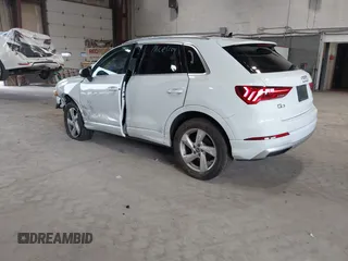 2020 Audi Q3 Premium with VIN WA1AECF3XL1090825, listed as a IAAI auction lot 42541577 with 32,432 mi miles and . Bid and sale history available at DreamBid. Image 3.