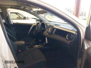 2014 Toyota RAV4 XLE with VIN JTMRFREV6EJ002755, listed as a IAAI auction lot 42021556 with 133,570 mi miles. Bid and sale history available at carsss.com. Image 5.