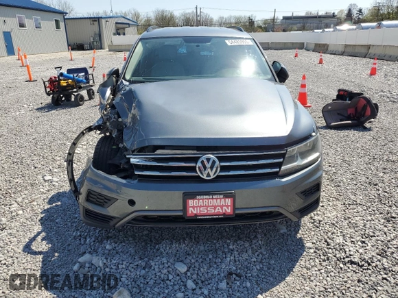 2018 Volkswagen Tiguan S with VIN 3VV0B7AX0JM111971, listed as a Copart auction lot 54485955 with 98,716 mi miles and Salvage Title. Bid and sale history available at DreamBid. Image 5.