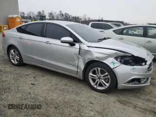2018 Ford Fusion Hybrid SE with VIN 3FA6P0LU4JR147224, listed as a Copart auction lot 88258295 with 90,132 mi miles and Clean Title. Bid and sale history available at carsss.com. Image 4.