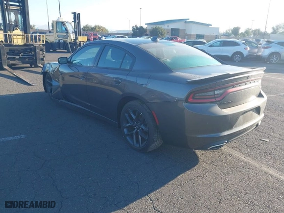 2023 Dodge Charger SXT with VIN 2C3CDXBGXPH600670, listed as a IAAI auction lot 41651977 with 2,594 mi miles. Bid and sale history available at carsss.com. Image 3.