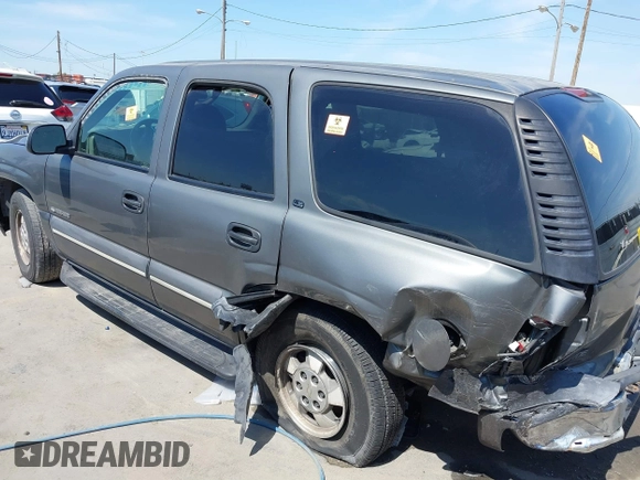 2002 Chevrolet Tahoe LS z VIN 1GNEC13V92R305304, wystawiony jako IAAI lot #41851210 z przebiegiem Nie podano mil oraz . Historia ofert i sprzedaży dostępna na DreamBid. Obrazek 6.