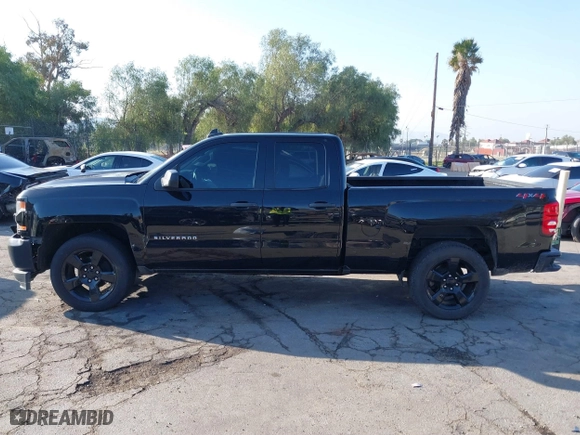 2018 Chevrolet Silverado 1500 Work Truck with VIN 1GCVKNEH3JZ247828, listed as a IAAI auction lot 41537573 with 134,684 mi miles. Bid and sale history available at carsss.com. Image 14.