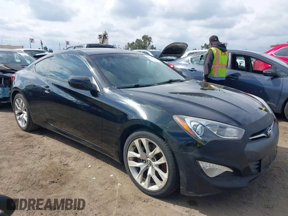 2014 Hyundai Genesis Coupe R-Spec z VIN KMHHT6KD4EU119873, wystawiony jako IAAI lot #38910385 z przebiegiem 127 596 mil mil oraz . Historia ofert i sprzedaży dostępna na DreamBid. Obrazek 1.