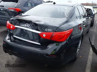 2015 Infiniti Q50 z VIN JN1BV7AR6FM412573, wystawiony jako IAAI lot #41796802 z przebiegiem 136 410 mil mil oraz . Historia ofert i sprzedaży dostępna na DreamBid. Obrazek 4.