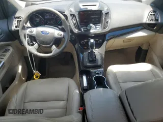 2015 Ford Escape Titanium z VIN 1FMCU0J98FUB06577, wystawiony jako Copart lot #61341175 z przebiegiem 66 206 mil mil oraz Szkoda całkowita • Salvage title. Historia ofert i sprzedaży dostępna na DreamBid. Obrazek 8.