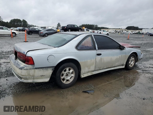 1990 Ford Thunderbird with VIN 1FAPP6046LH182637, listed as a Copart auction lot 82300484 with 149,365 mi miles and Salvage Title. Bid and sale history available at DreamBid. Image 3.