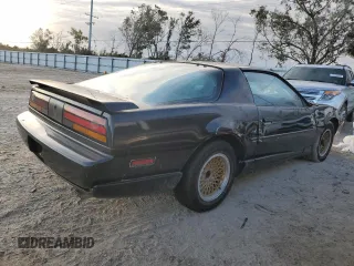 1992 Pontiac Firebird z VIN 1G2FS23T0NL203325, wystawiony jako Copart lot #76359414 z przebiegiem 198 651 mil mil oraz Nie do naprawy • Non repairable. Historia ofert i sprzedaży dostępna na DreamBid. Obrazek 3.