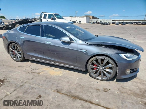 2016 Tesla Model S 90D z VIN 5YJSA1E40GF145137, wystawiony jako Copart lot #62027605 z przebiegiem 92 060 mil mil oraz Szkoda całkowita • Salvage title. Historia ofert i sprzedaży dostępna na DreamBid. Obrazek 4.